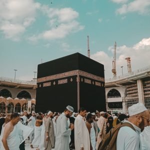 Photo by Taha Elahi: https://www.pexels.com/photo/people-praying-on-the-street-7984586/